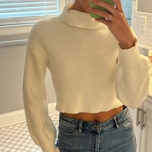 Cropped white turtleneck sweater